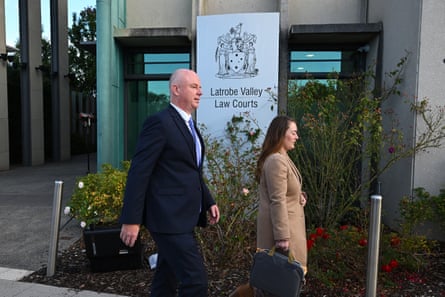 Simon Patterson (left) leaves the Latrobe Valley magistrates court in Morwell on Thursday