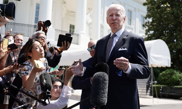 Joe Biden speaks with reporters before boarding Marine One in Washington DC on 17 June.
