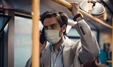 Commuter wearing a face mask