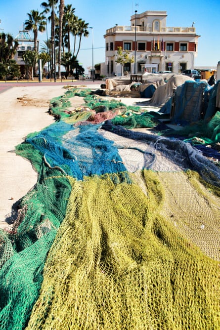 Fishing nets laid out on the floor