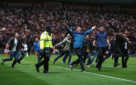 Preston fans invade the pitch