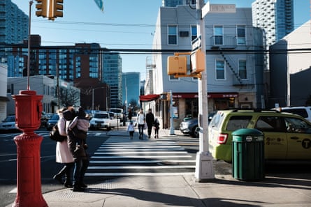 People walk through the Long Island City neighborhood on February 09, 2019 in New York City.