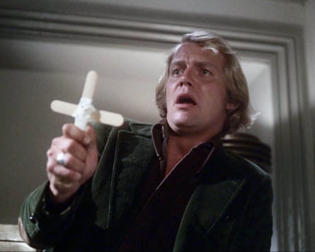 Man with a crucifix.