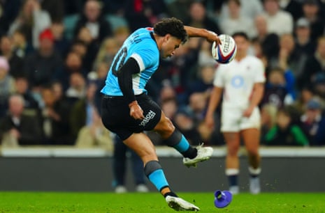 Caleb Muntz of Fiji kicks his side into a 13-7 lead with a penalty.