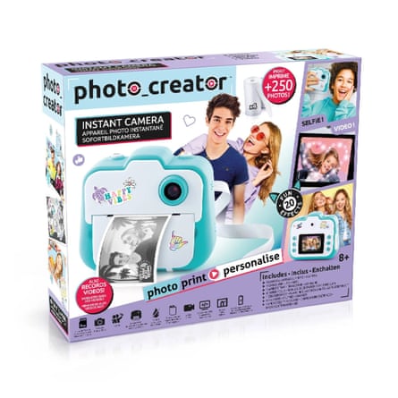 Packaging for the Photo Creator Instant Camera shows teenagers posing and printed photos