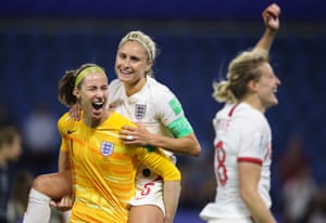 Karen Bardsley carries England teammate Steph Houghton after the Women’s World Cup quarter-final victory over Norway.