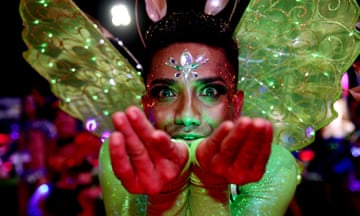 Parade goers march inside the Sydney Cricket Ground during the 44th Sydney Gay and Lesbian Mardi Gras Parade on March 05, 2022 in Sydney, Australia.