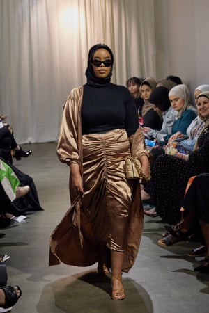 A model wears Bulle Designs on the modest runway