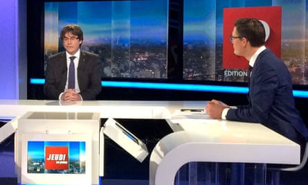 Catalan President Carles Puigdemont is interviewed on TV in Brussels.