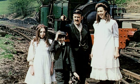 Bernard Cribbins as Perks the station porter, second from right, with, from left, Sally Thomsett, Gary Warren and Jenny Agutter in The Railway Children, 1970.