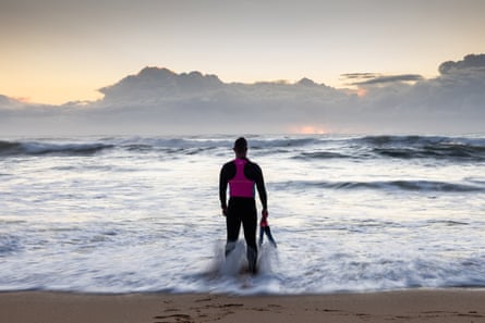 Graham Russell standing at the shoreline on MacMasters Beach