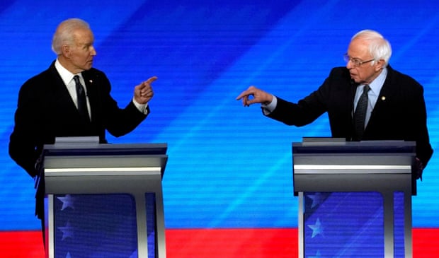 Bernie Sanders in a presidential
                            candidate debate with Joe Biden in February
                            2020