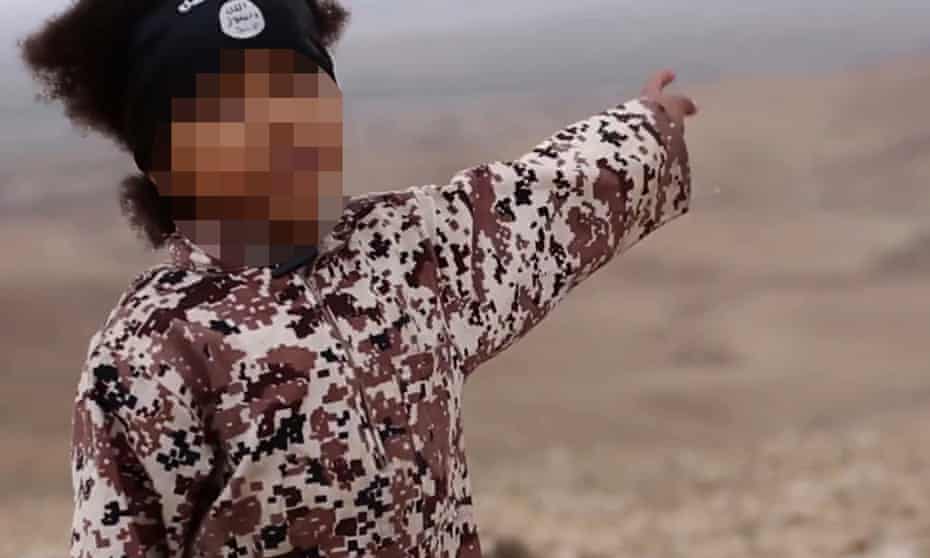 Screengrab from a video purporting to be Isis showing a young boy making threats to kill.