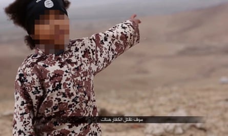 Screengrab from a video purporting to be Isis showing a young boy making threats to kill