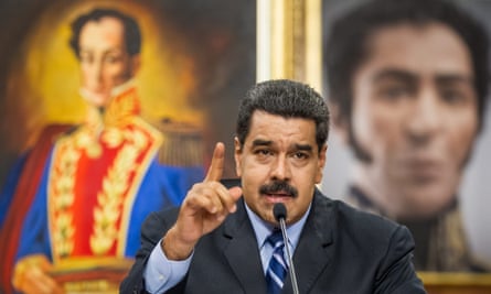 Nicolás Maduro speaks during a press conference at the presidential palace in Caracas.