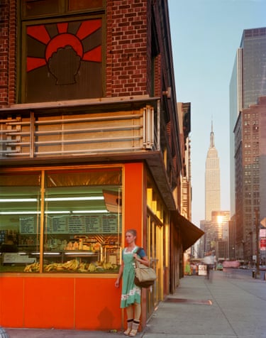 Young Dancer, Empire State Series, New York City, 1978 ‘This is one of those pictures that has multiple layers. On the one hand it’s simply a New York City corner with late afternoon sunlight on the Empire State Building, but also, the ballet dancer waits on the corner, next to a grocery store window with a crazy colour palette of orange on the outside; over ripe bananas in the window, neon greenlights inside matching her green dress and the other greens seen down the street, and overhead, a crazy red sunburst and sets of naked florescent tubes hold a bit of the late afternoon light.’