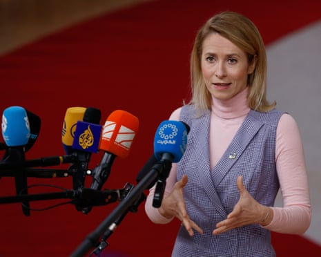 European Union foreign policy chief Kaja Kallas speaks with the media as she arrives for the EU Summit in Brussels.