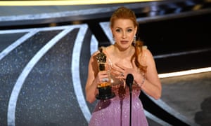 Jessica Chastain accepts the award for Best Actress in a Leading Role for her performance in The Eyes of Tammy Faye