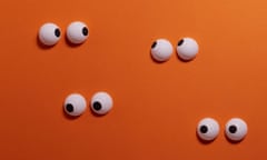 An illustration of pairs of eyes on an orange background