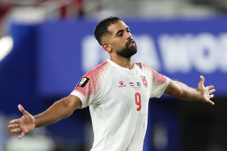 Ali Olwan of Jordan celebrates scoring his team's first goal