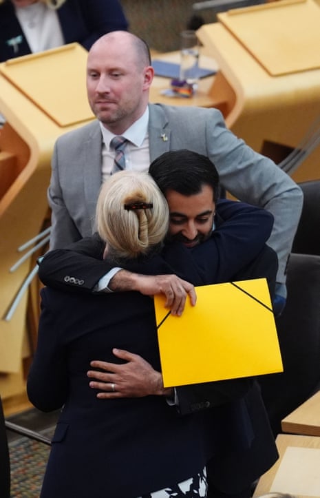 Humza Yousaf embracing Shona Robison, deputy first minister, after making his final speech to MSPs as firsts minister.