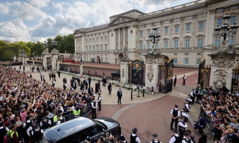 King Charles III and the Queen Consort arriving at Buckingham Palace on Friday.
