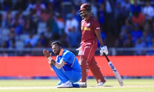 India’s Hardik Pandya (left) celebrates taking the wicket of West Indies’ Sunil Ambris by LBW.