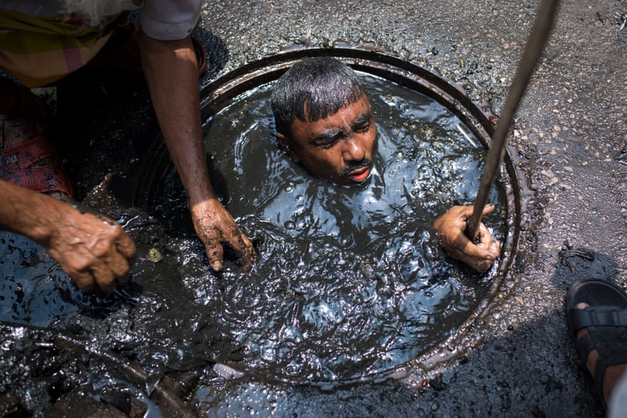 A sewer cleaner of in Dhaka, Bangladesh.