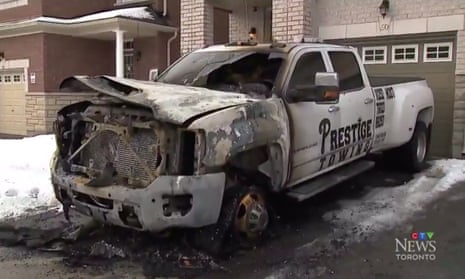 A burned-out tow truck in Toronto. Much of trouble stems from ‘accident chasing’ – where truck operators race their rivals to be the first at the scene of a crash.