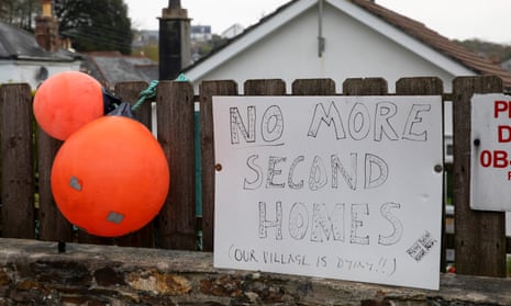 A sign saying 'No more second homes' in St Agnes, Cornwall