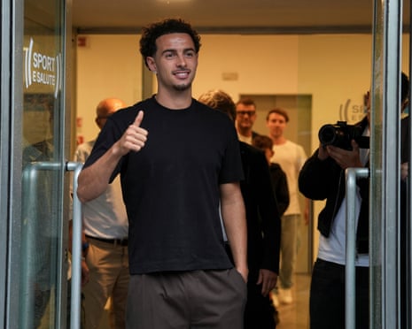 Curtis Jones gives a thumbs up as he leaves the Italian Olympic Commitee headquarters after medical tests.