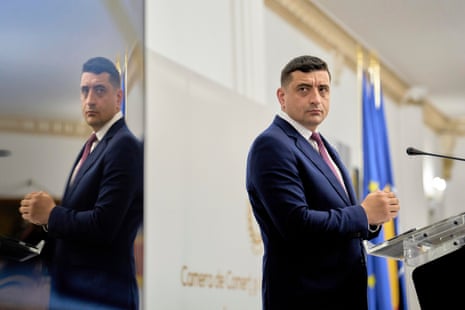 Presidential candidate George Simion waits to address members of the business community at the Chamber of Commerce and Industry of Romania, days ahead of the second round of the presidential election redo in Bucharest, Romania.