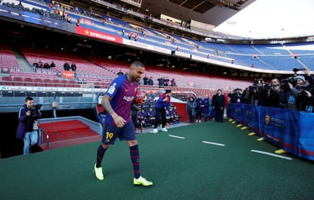 Boateng walks out for his unveiling at the Camp Nou