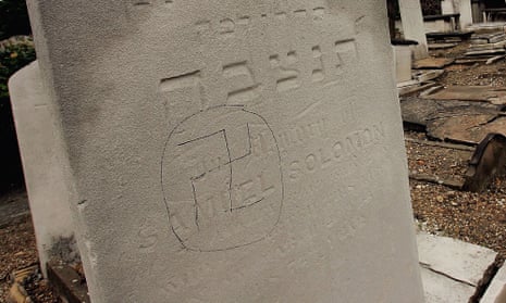 A swastika is daubed on a Jewish gravestone
