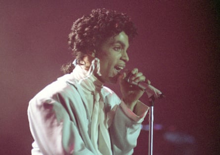 Prince performs during his Sign o’ the Times Tour in West Berlin, Germany