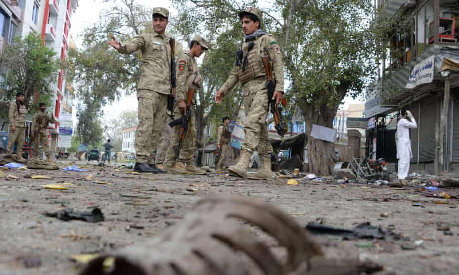 Afghan security personnel at the scene of a suicide attack in Jalalabad. A high court judicial review is due to take place on whether deportations to Afghanistan remain safe in view of the worsening security situation