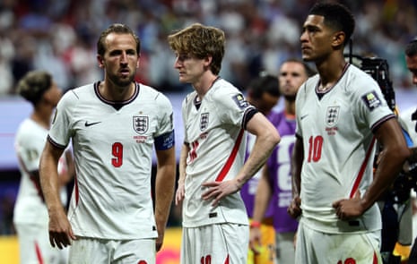 England players look stunned after their defeat by Argentina.