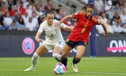 Lucy Bronze keeps a close eye on Aitana Bonmati, a Barcelona teammate, during England’s win over Spain at the Euros.