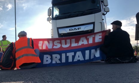 Protesters taking part in blocking the M25 motorway in London