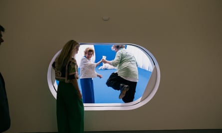 Artist Børre Sæthre show’s Norway’s Queen Sonja his installation My Private Sky, as museum director Solveig Øvstebø (left) looks on.