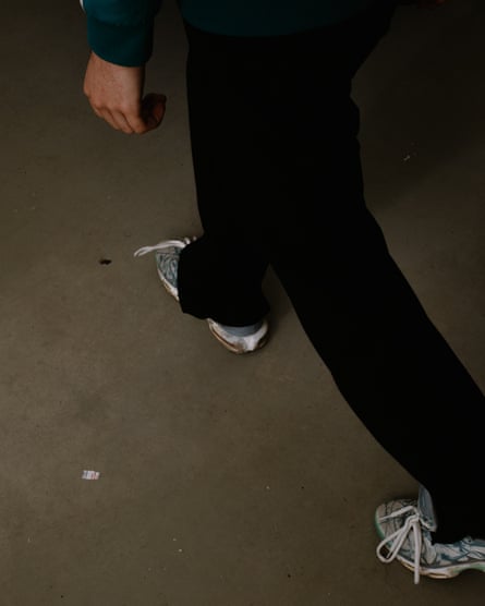 A child’s legs walking in the dark