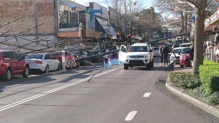 Scaffolding collapses on cars in Gosford on Wednesday.
