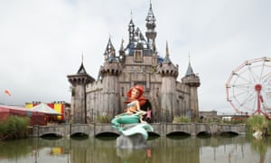 A mermaid and castle by Banksy at Dismaland.