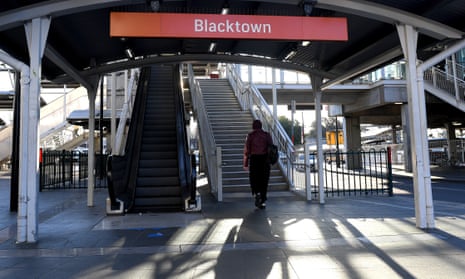 People are seen in Blacktown train station. NSW police fined 31 people who attended a service at the Christ Embassy Sydney church in Blacktown. The suburb is is one of the Sydney local government areas of concern for Covid and is subject to stricter lockdown restrictions.