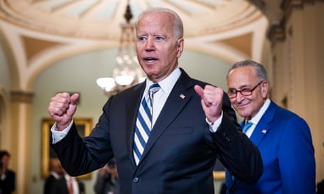 Joe Biden departs a Democratic Senate luncheon with Chuck Schumer in Washington DC.