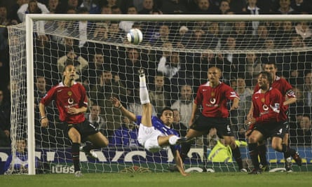 An acrobatic effort by Tim Cahill is cleared off the line by Wes Brown in April 2005.