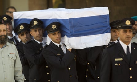 Members of the Knesset guard carry the coffin of Shimon Peres at the Knesset in Jerusalem on Friday