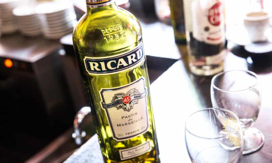 A bottle of Ricard on a table