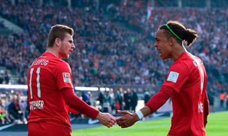 RB Leipzig’s Timo Werner, left, is congratulated by Yussuf Poulsen on his way to a brace in front of the hostile Hertha Berlin crowd.