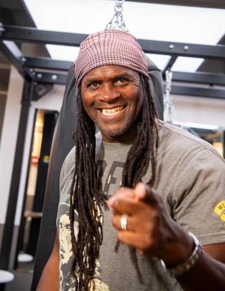 Audley Harrison points at the camera with a smile